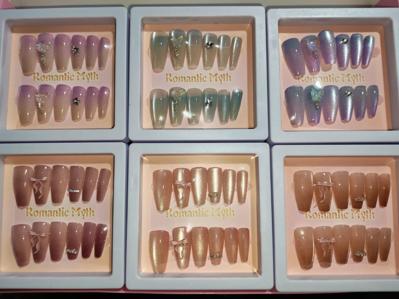 UÑAS POSTIZAS OJOS DE GATO CON PEDRERIA